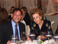 Carlos Picón, Curator in Charge of the Department of Greek and Roman Art at the Metropolitan Museum of Art enjoys the evening with Gennadius Library Trustee Irene Moscahlaidis.